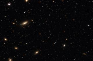 Галактики ускорили падение в гравитационные ямы по новой методике — Университет Женевы