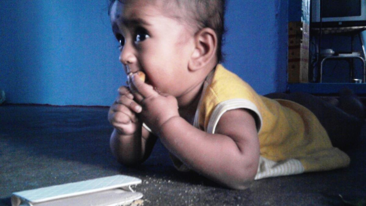 Tamil baby eating biscuit 2 Tamil baby eating biscuit 2