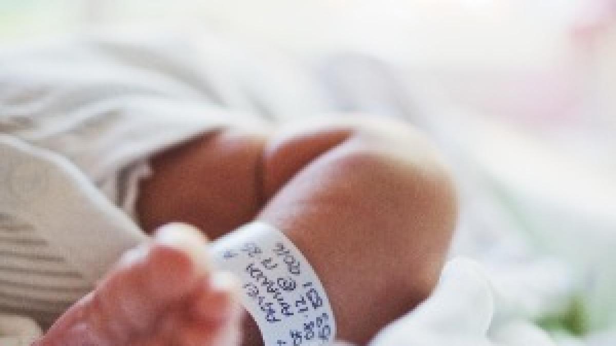 Baby leg with hospital tag Baby leg with hospital tag