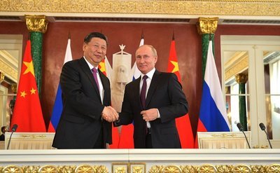 На приеме в честь визита Владимира Путина в КНР гостей угощают китайскими блюдами