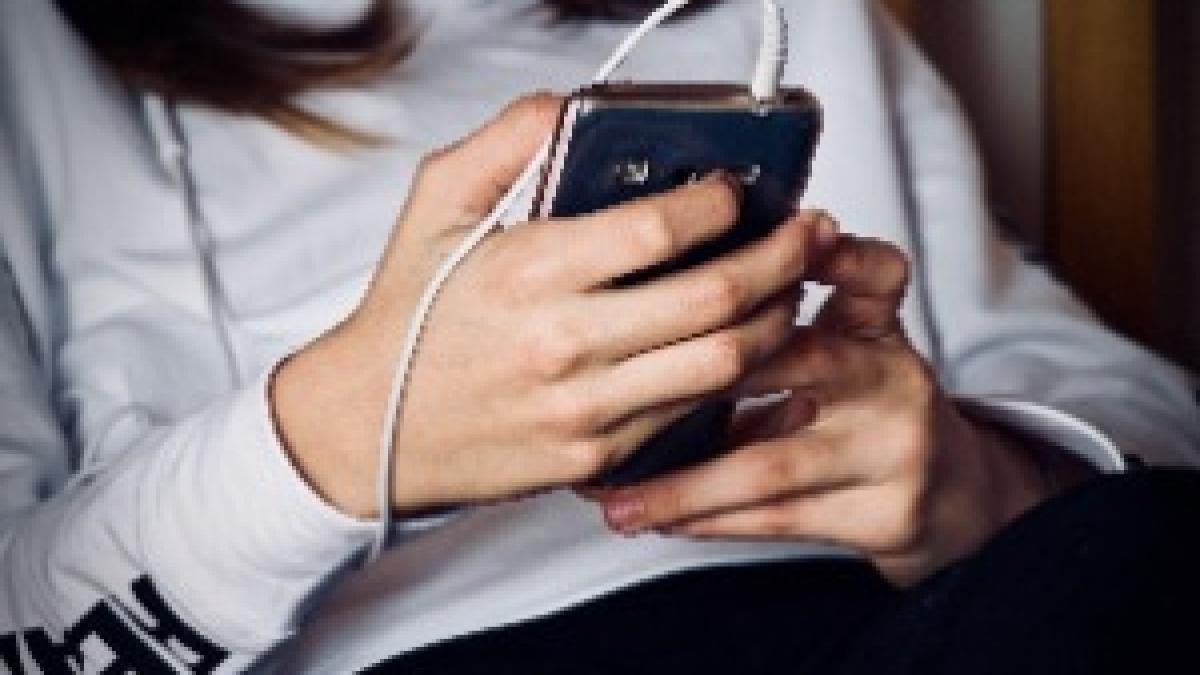 Woman holding cell phone 3236059 Woman holding cell phone 3236059