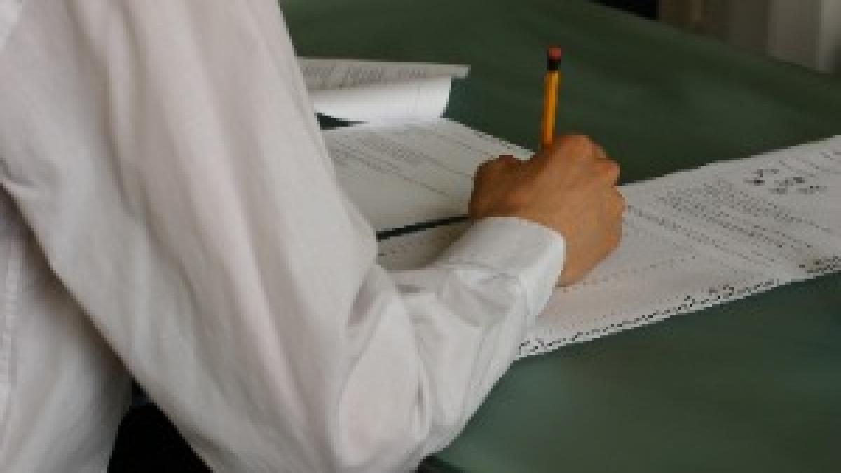Hand-writing-exam-classroom